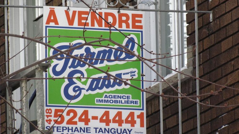 Pancarte immobilière à vendre